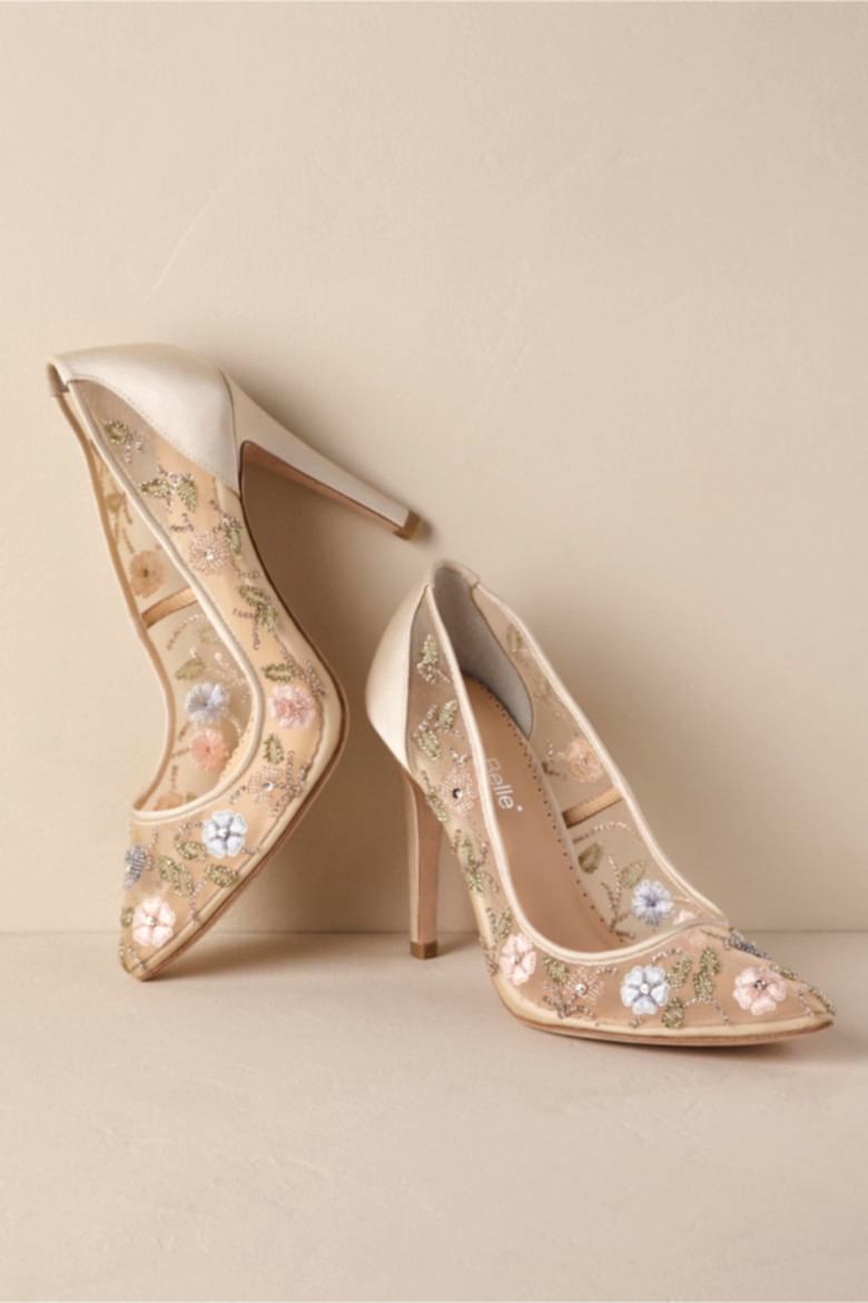 shoes sitting against a wall