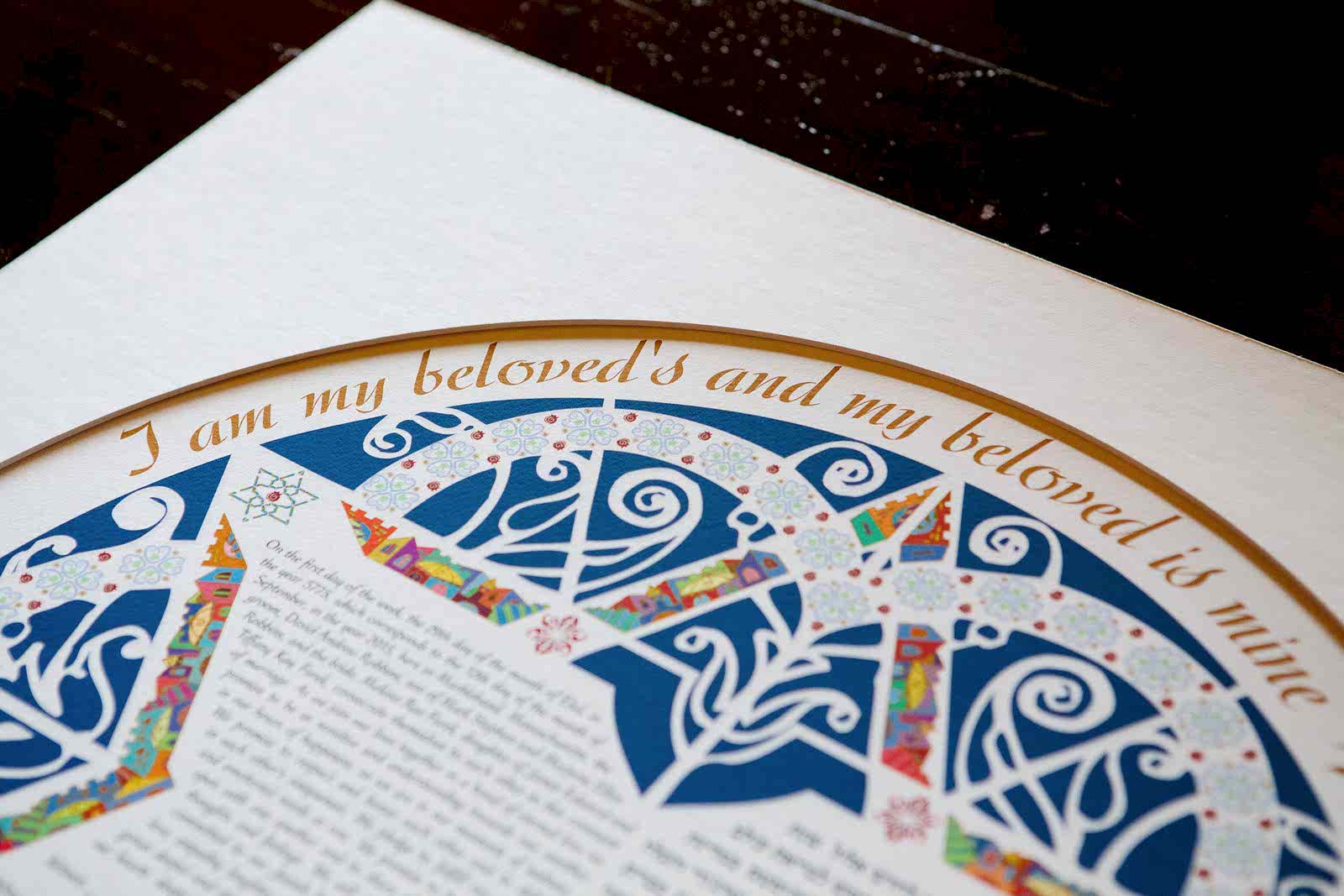 a close up of a ketubah that says "I am my beloved's and my beloved is mine"