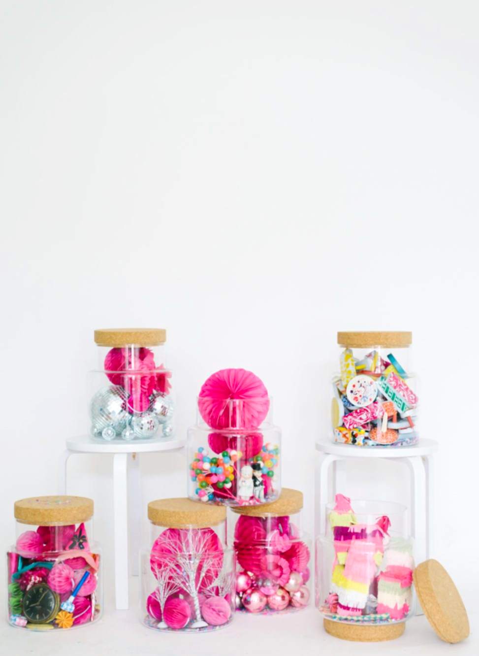 wedding party terrarium with pink and yellow mini pinatas