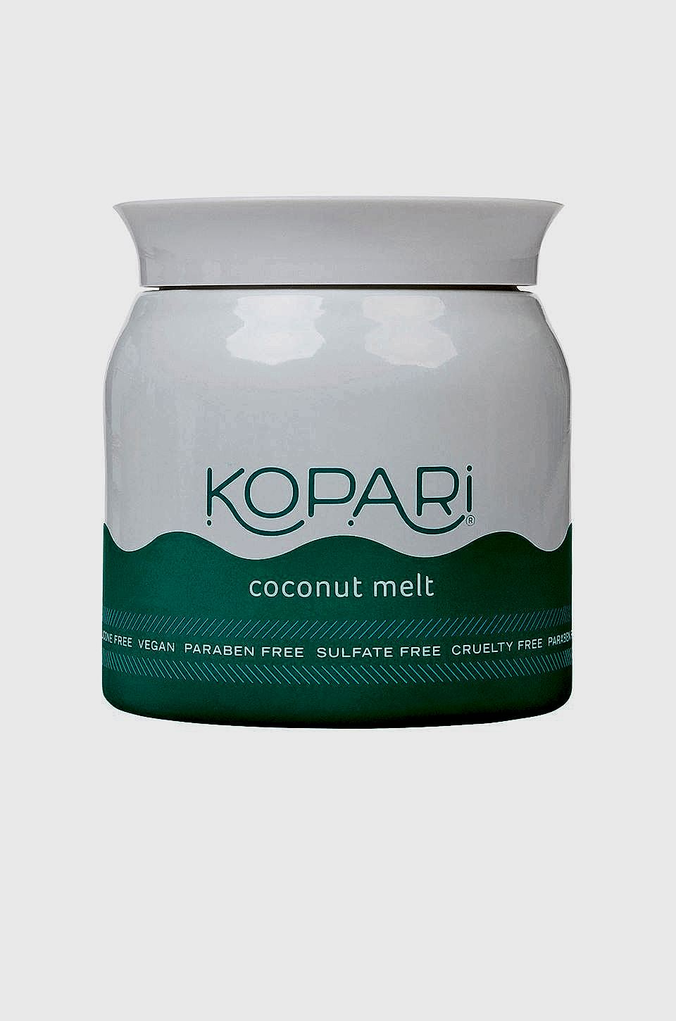 Teal and white jar of Kopari coconut melt
