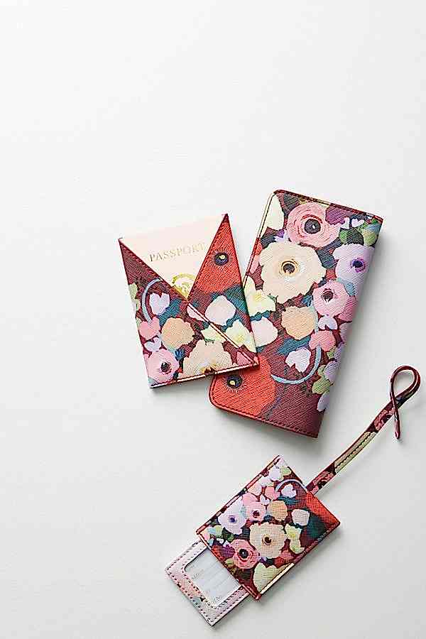  Leather, floral printed passport pocket, luggage tag holder and glasses case on white background
