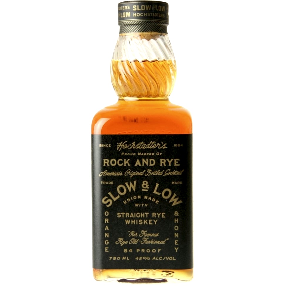 Bottle of whiskey on white background