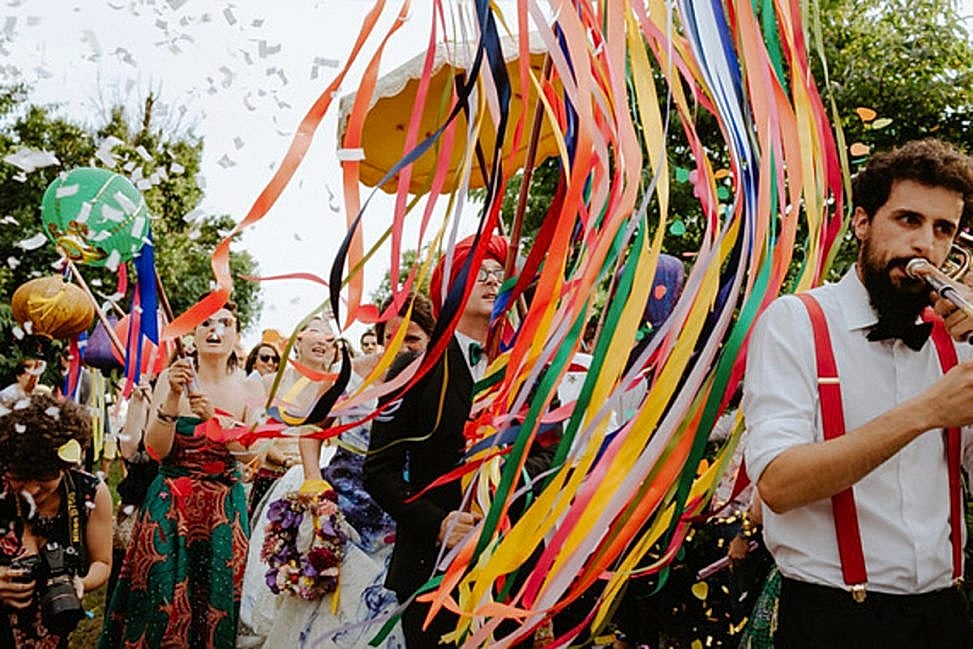 parade with confetti and streamer flags