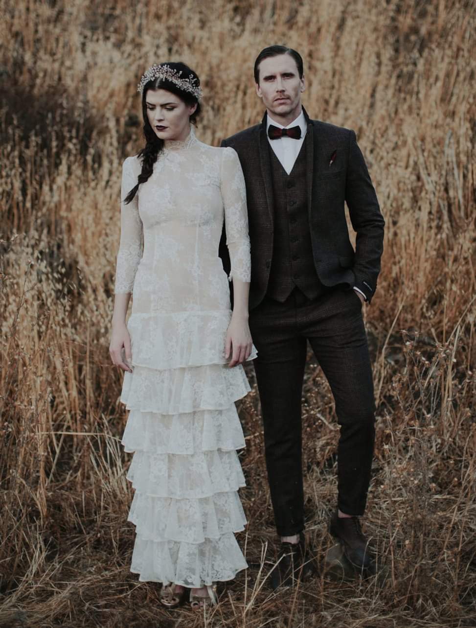 couple weaning vintage formal wear with moody editing