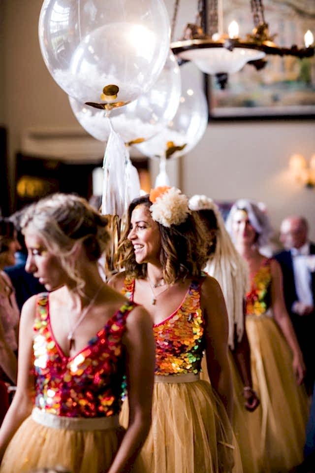 bridesmaids wearing matching sequin dresses 