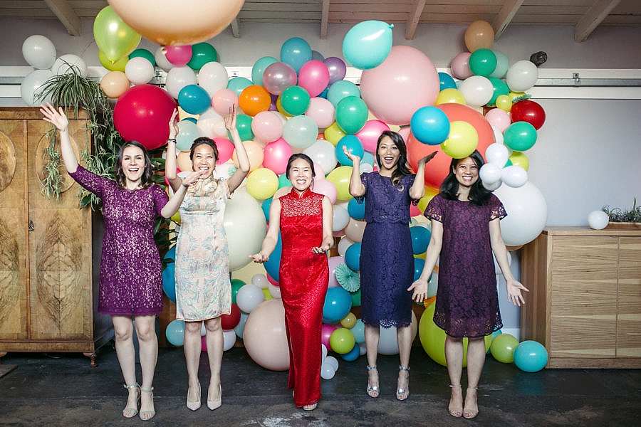 Bride with her maid of honor and wedding party