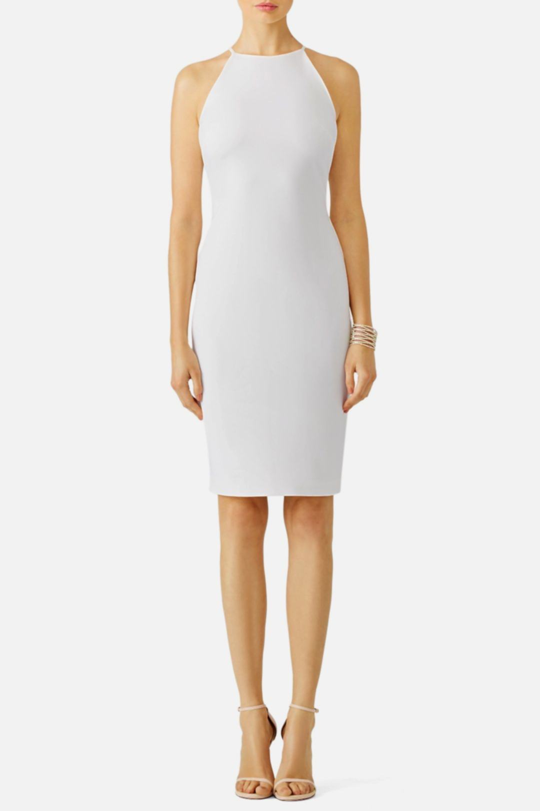 woman wearing a white halter dress