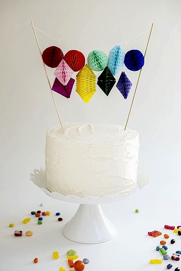 paper honeycomb cake topper—mini geometric shapes in a rainbow of bright colors