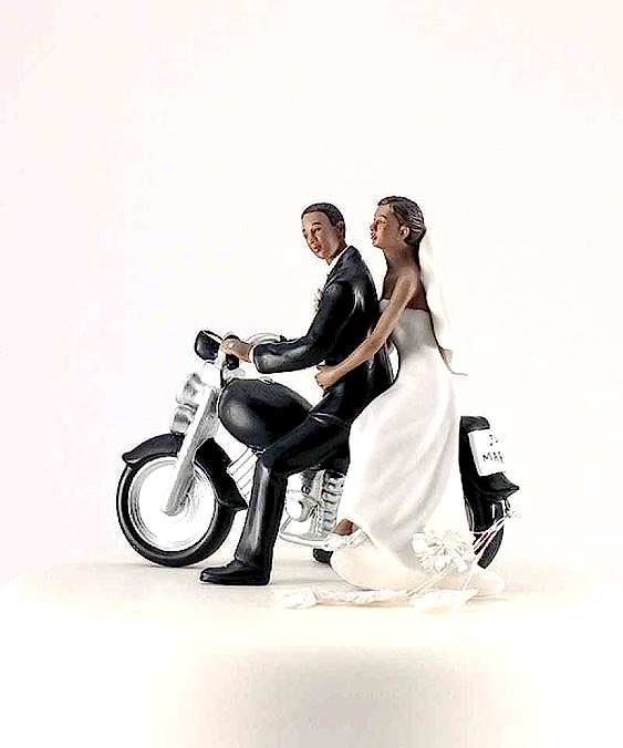 black bride and groom on a motorcycle wedding cake topper