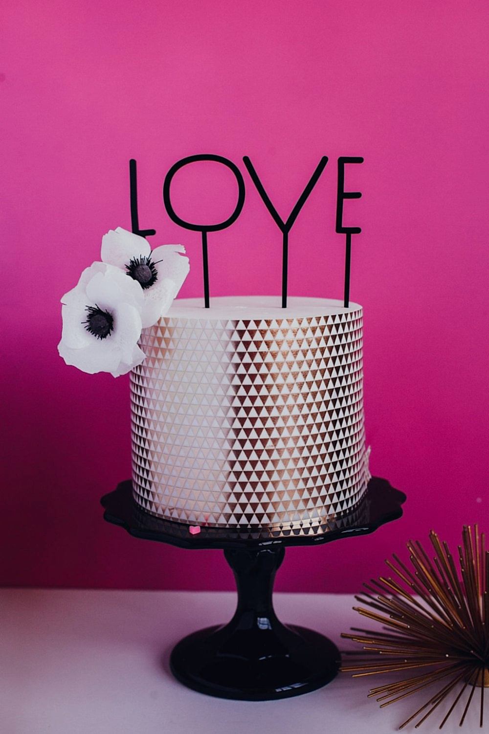 typography "love" cake topper
