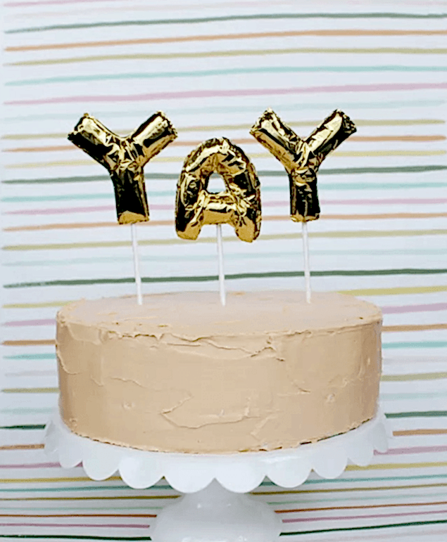 Gold Mylar balloon "yay" cake topper