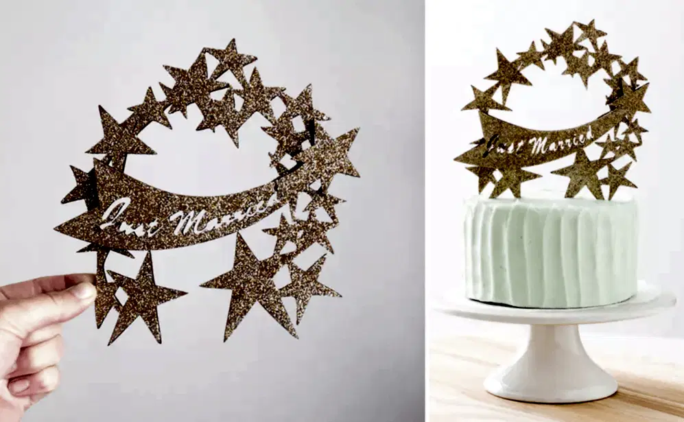 golden glitter stars that say just married wedding cake toppers