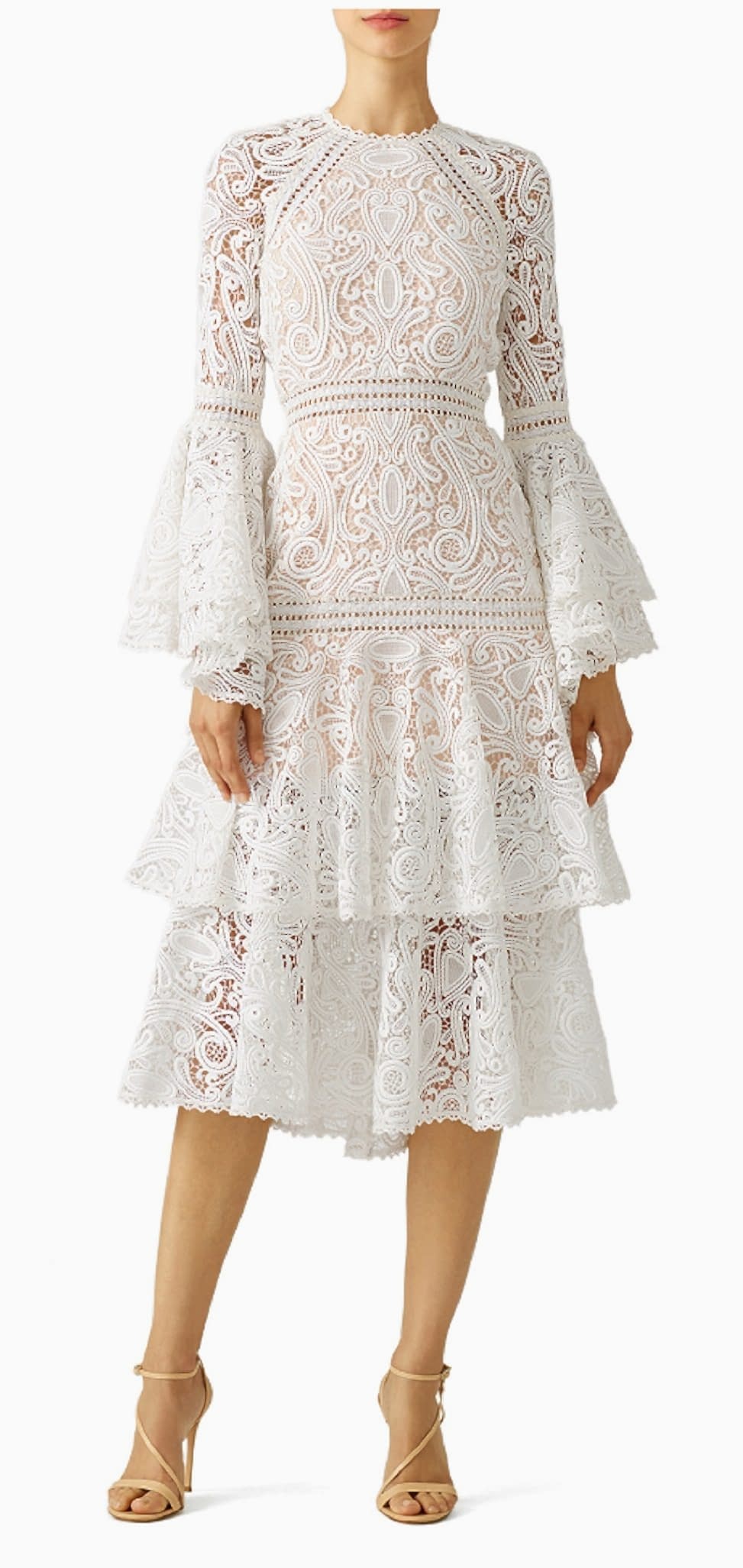 woman wearing an intricate white lace dress