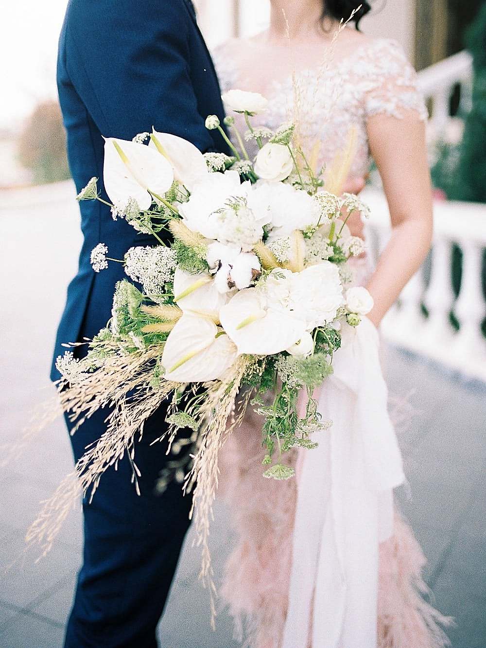 white and green bridal cascade bouquet with wheat and cotton