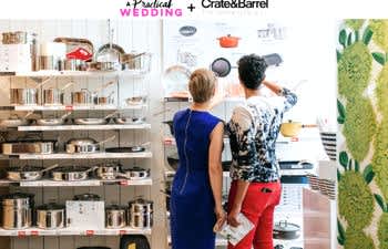 two women standing in front of a shelf of kitchenware at a crate and barrel LGBTQ wedding registry event