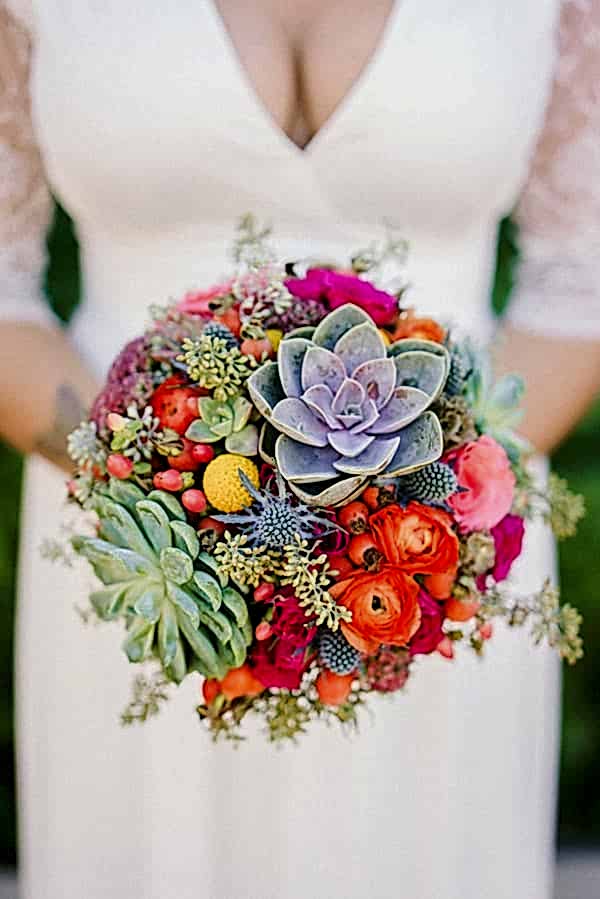 brightly colored round bouquet with succulents