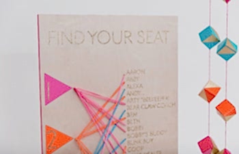 Colorful seating chart made with brightly colored rubber bands