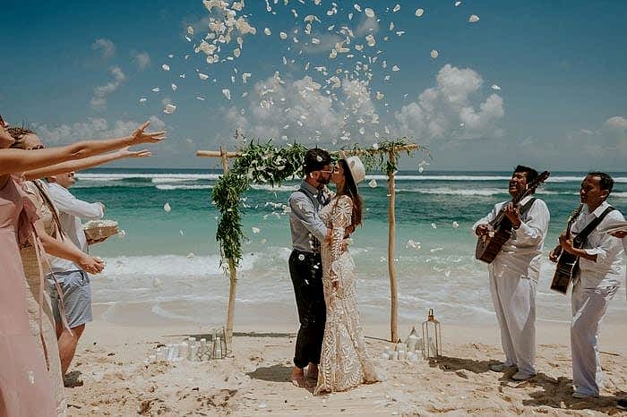 A wedding ceremony on the beach.