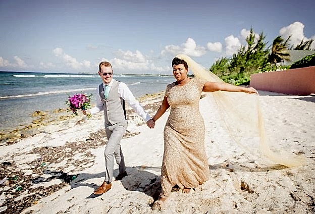 Bride in a glitter dress on a beach
