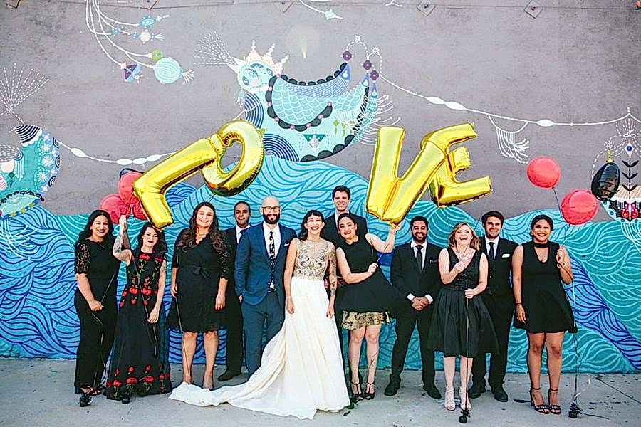 wedding party with Love balloons