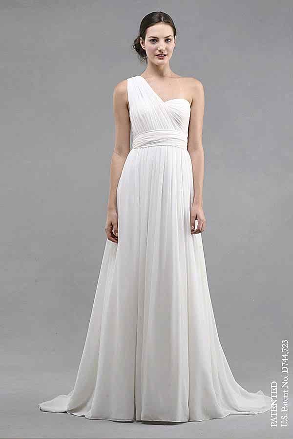 A woman wears a white grecian-style one-shoulder dress 