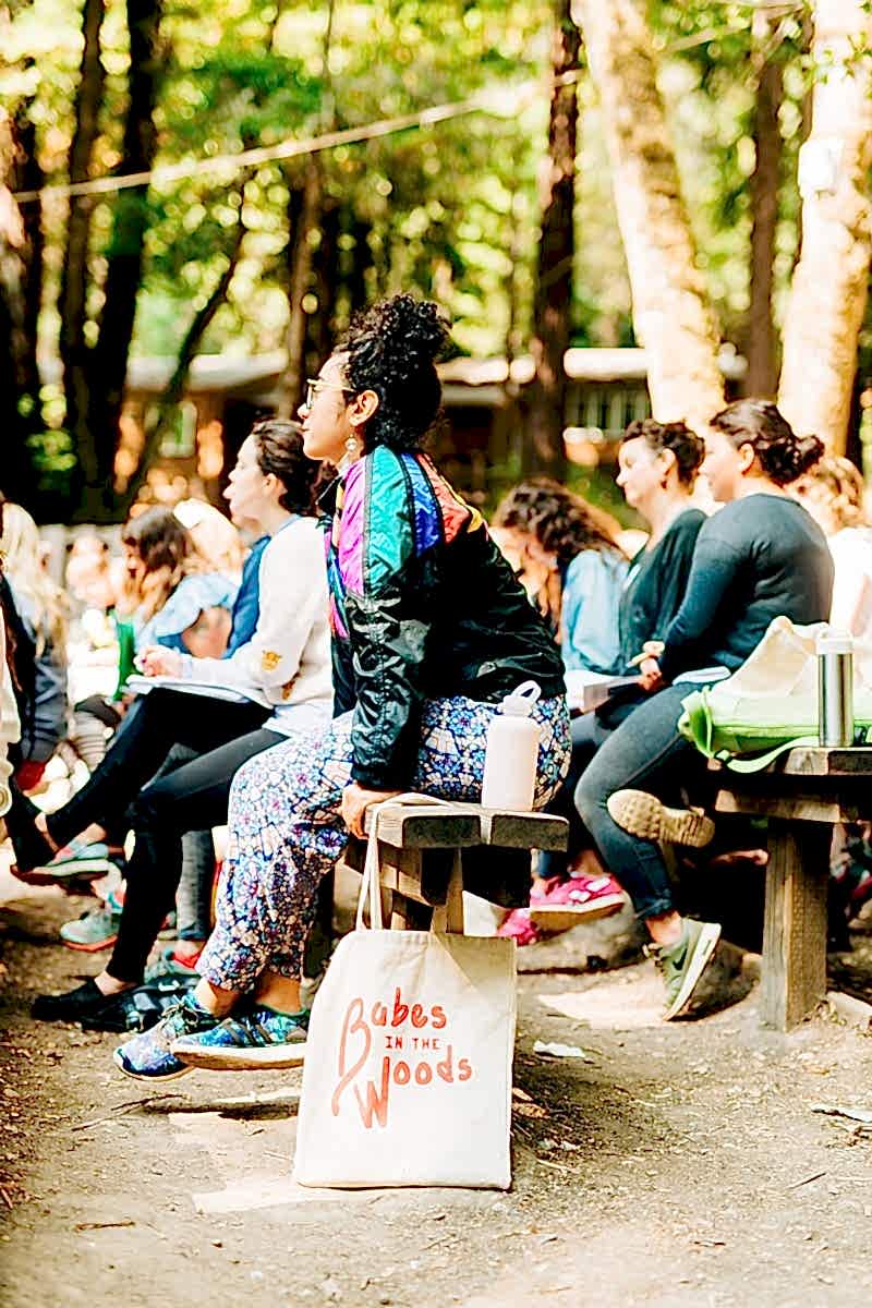Women listening intently during Jay Pryor's workshop at the compact summer camp in la Honda, CA
