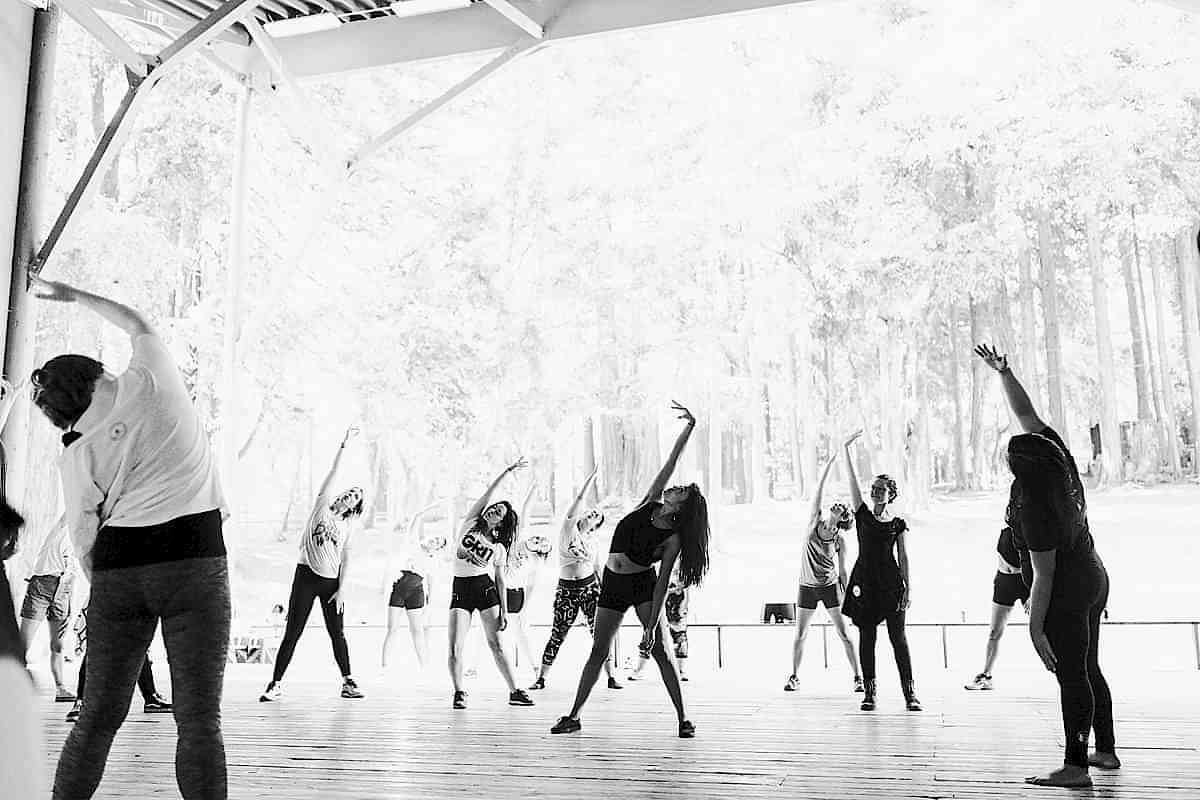 Women dancing during a dance workshop with Nicole Gervacio at the compact summer camp in la Honda, CA