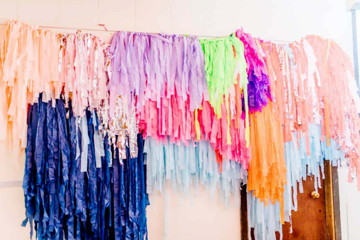 A colorful fringe wall installation at the compact summer camp in la Honda, CA