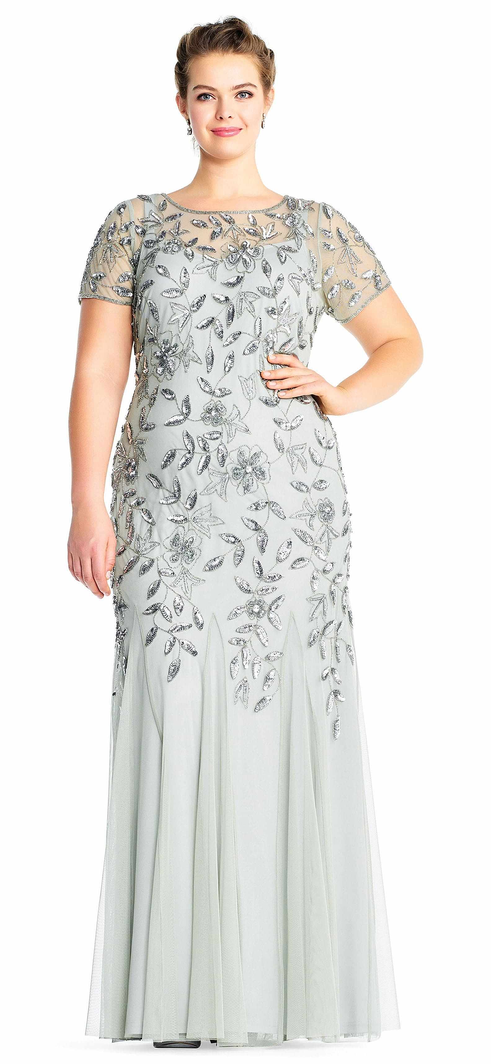plus size woman wearing a blue beaded wedding gown