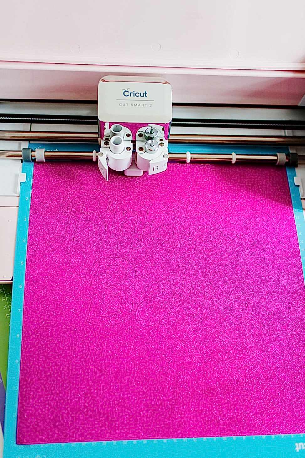 The cut text "Bride's Babe" using the Cricut Explore Air 2 Machine from Michael's Weddings