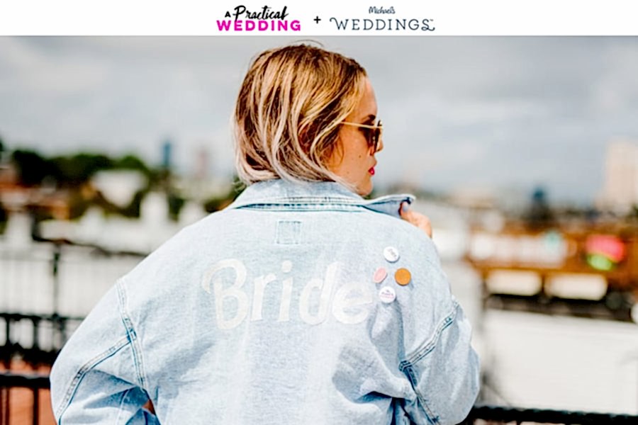 Woman in a denim jacket that says "Bride" across the back. The text, "A Practical Wedding + Michael's Weddings," reads across the top.