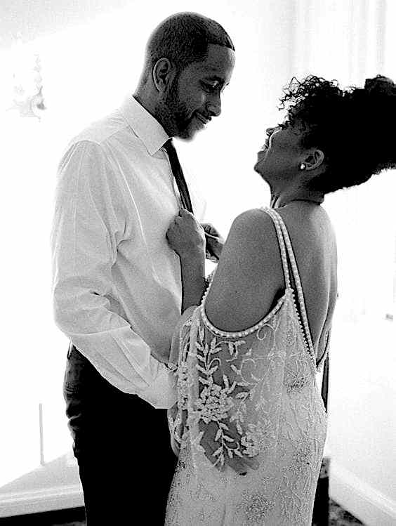 wedding ideas - african-american couple laughing and getting ready together