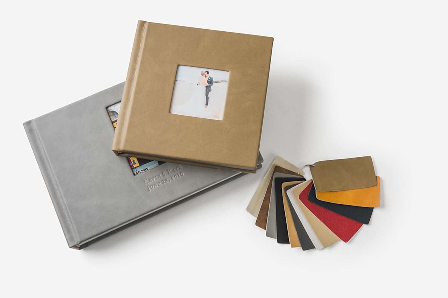 medium close up of leather flat lay wedding albums by Albums Remembered with a swatch of leather color options