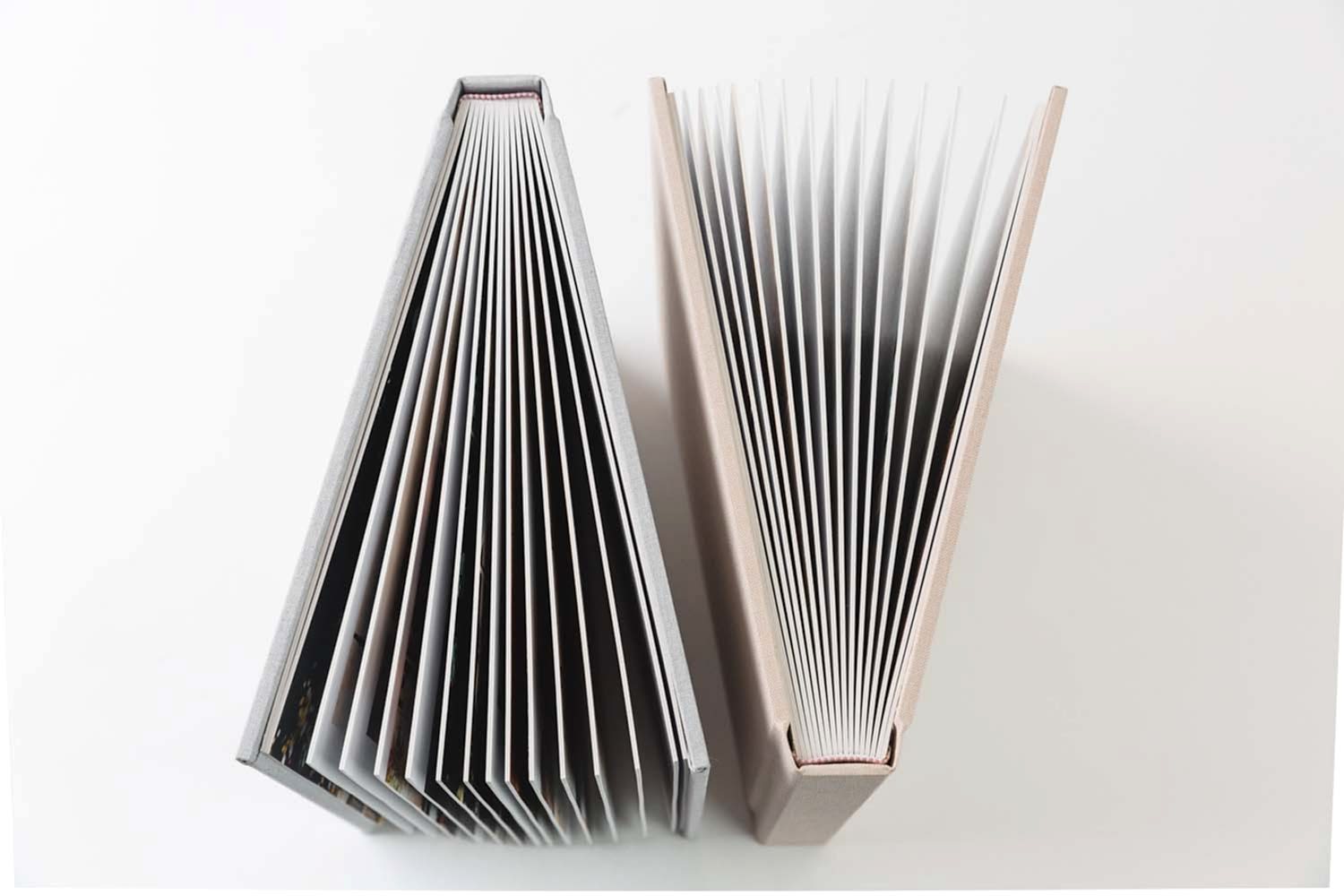 close-up shot of a two flat lay wedding albums by Albums Remembered from above to show off their thick cardstock pages
