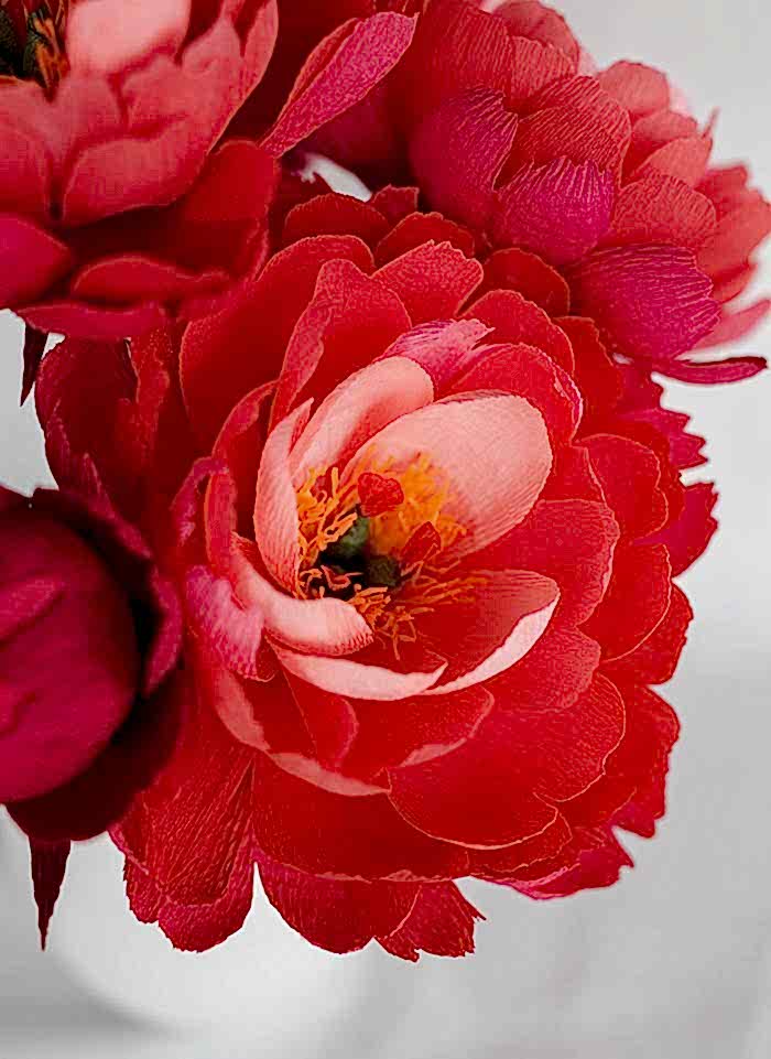Bouquet of red paper flowers for a wedding without flowers
