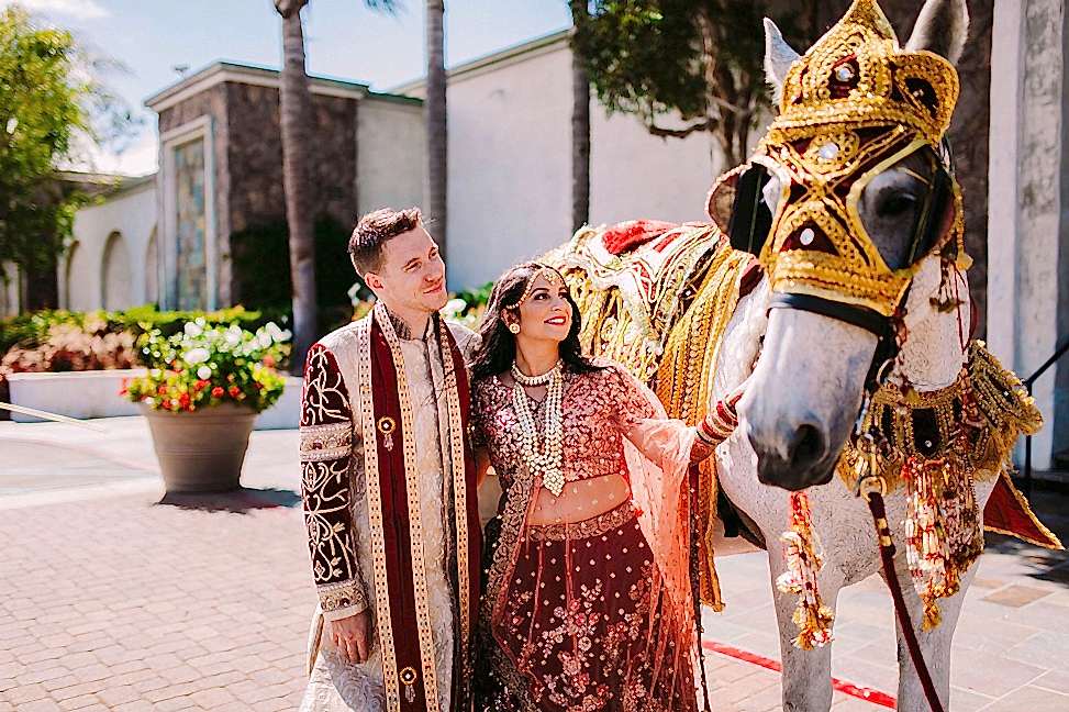 Bride and groom with horse