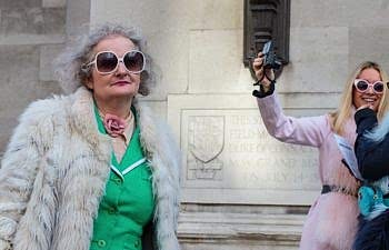 Adulthood - An older woman poses for a photo
