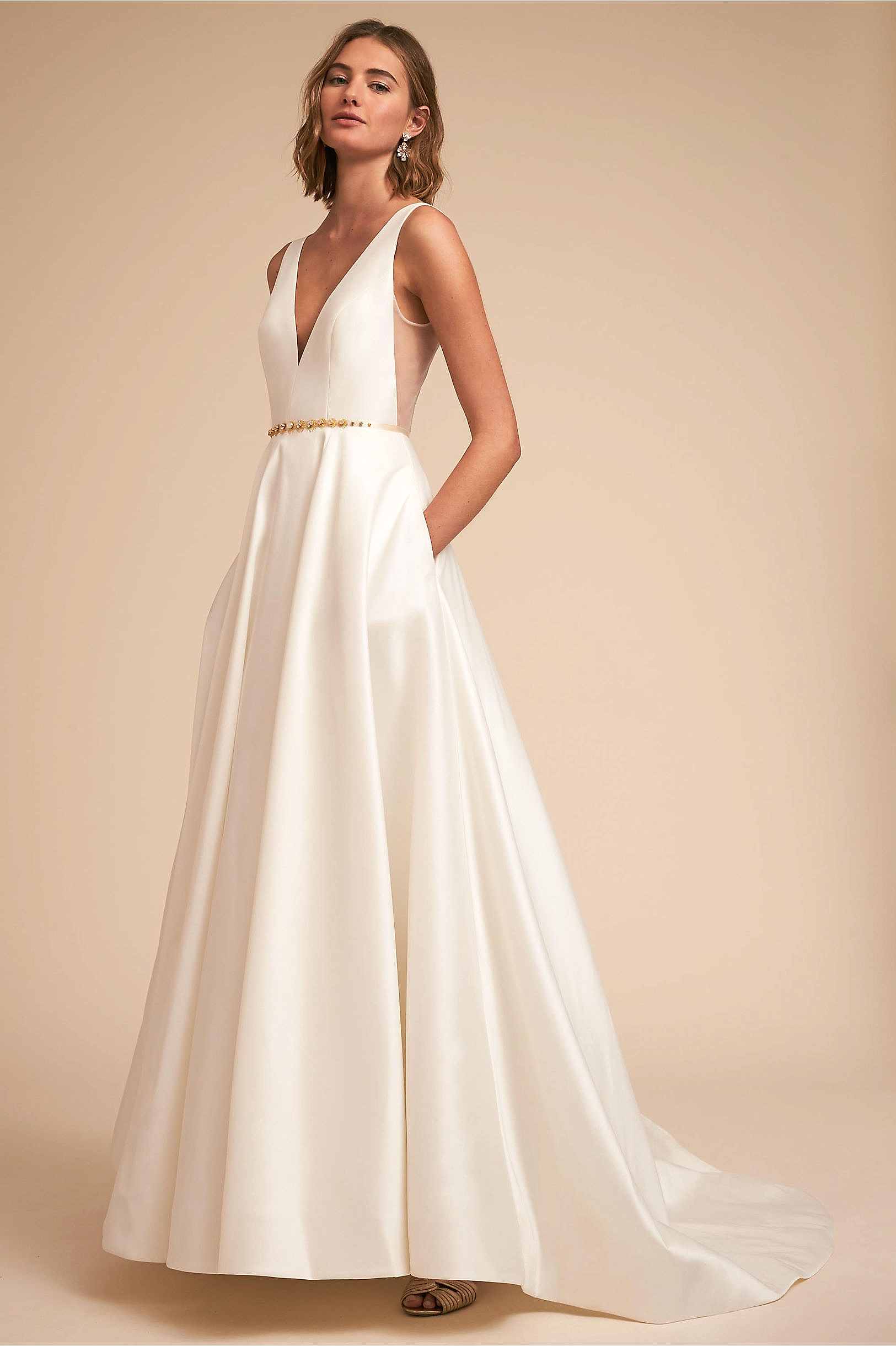 woman wearing a white dress with a sheer back