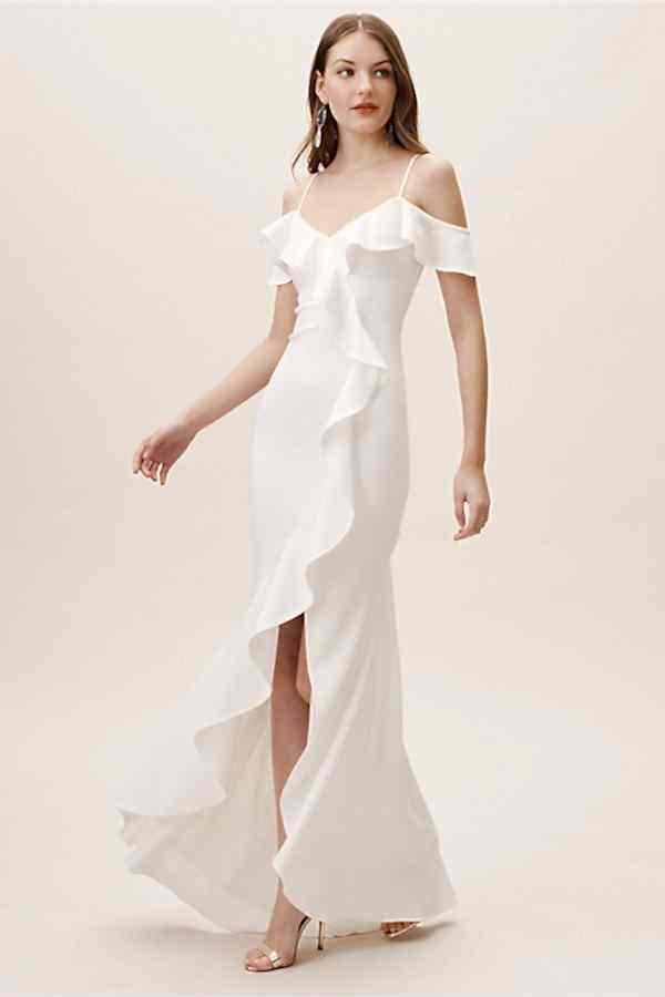 woman wearing a wedding dress with a flutter hemline