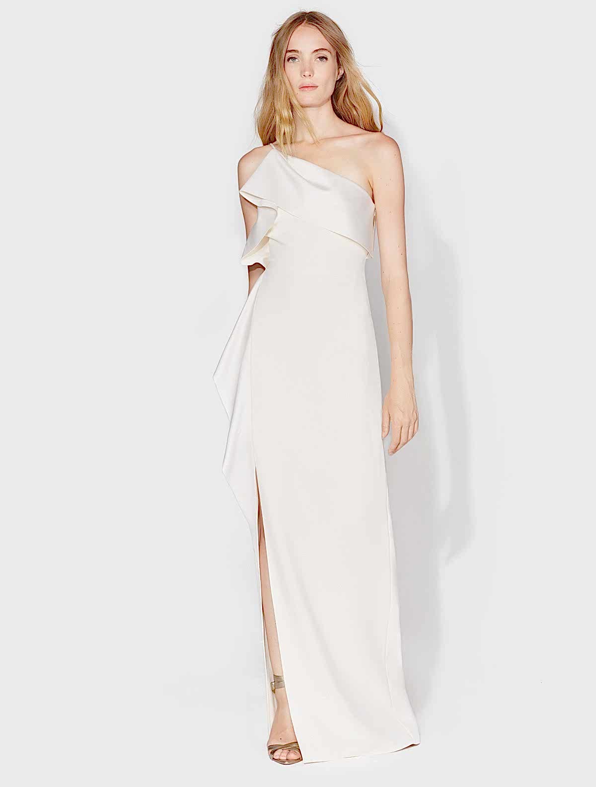 blonde woman wearing a one shoulder long wedding dress