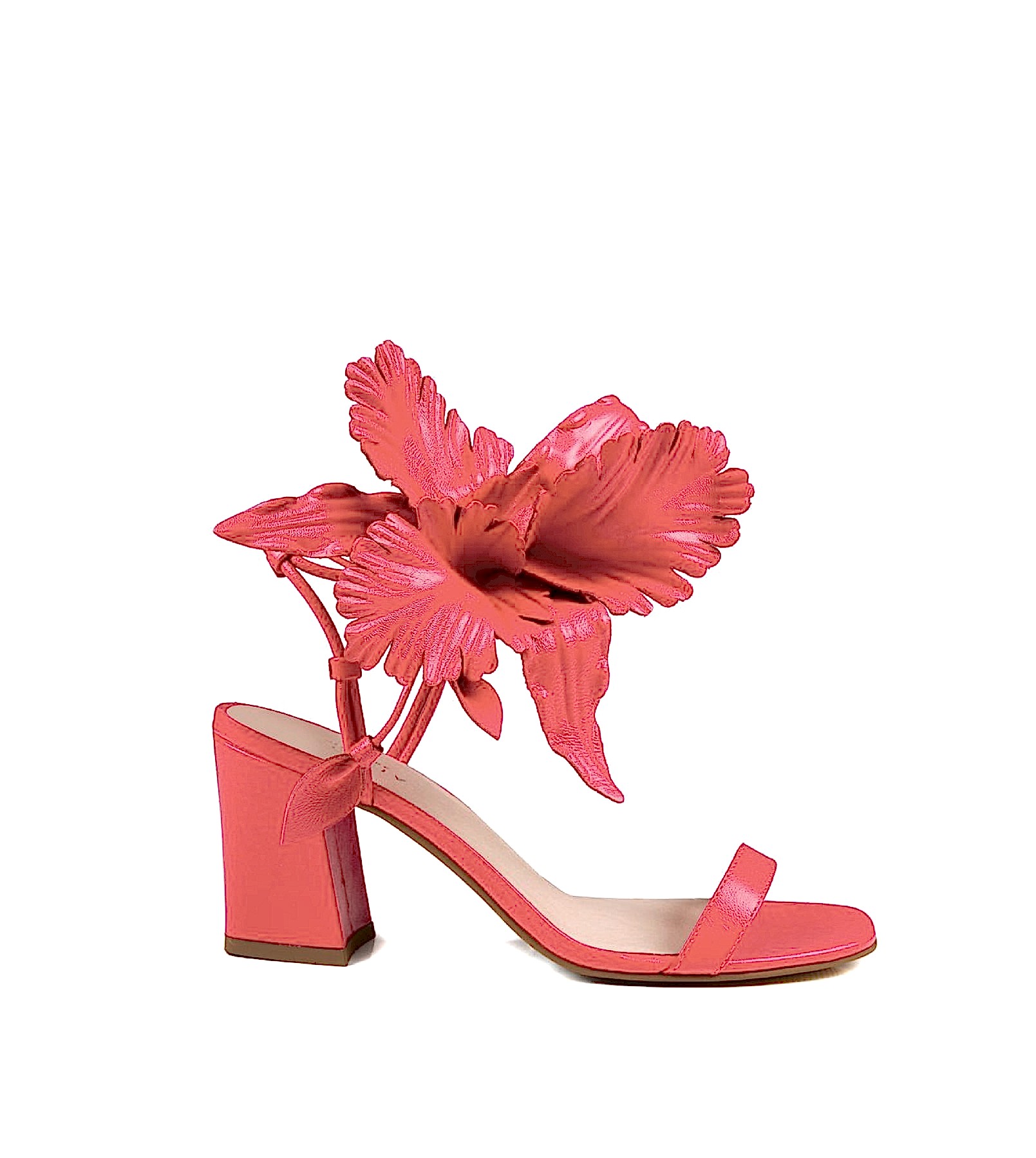 Bright red platform heels with a large red flower