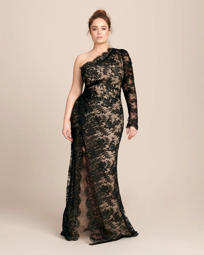 A woman wears an Off the shoulder, form fitting, and full of elegance.