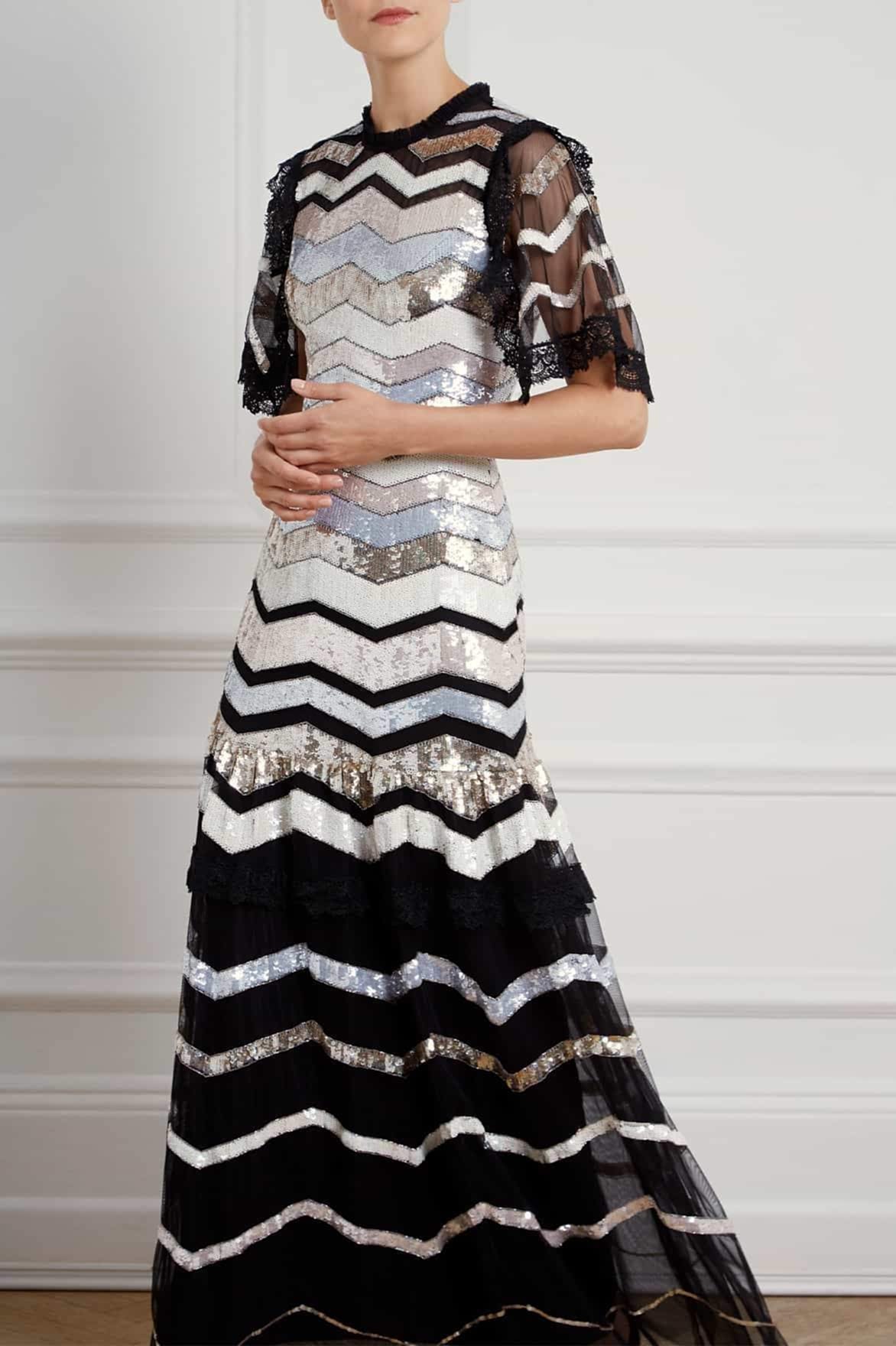 A black dress with a zig zag design pattern.