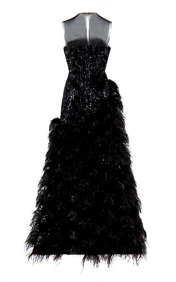 A full length gown with a feathered skirt. Black wedding dresses.