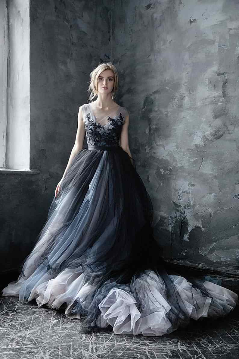 A woman wears a dress that is perfect for those princess nights when you're looking to add a touch of darkness without losing any of your magic.