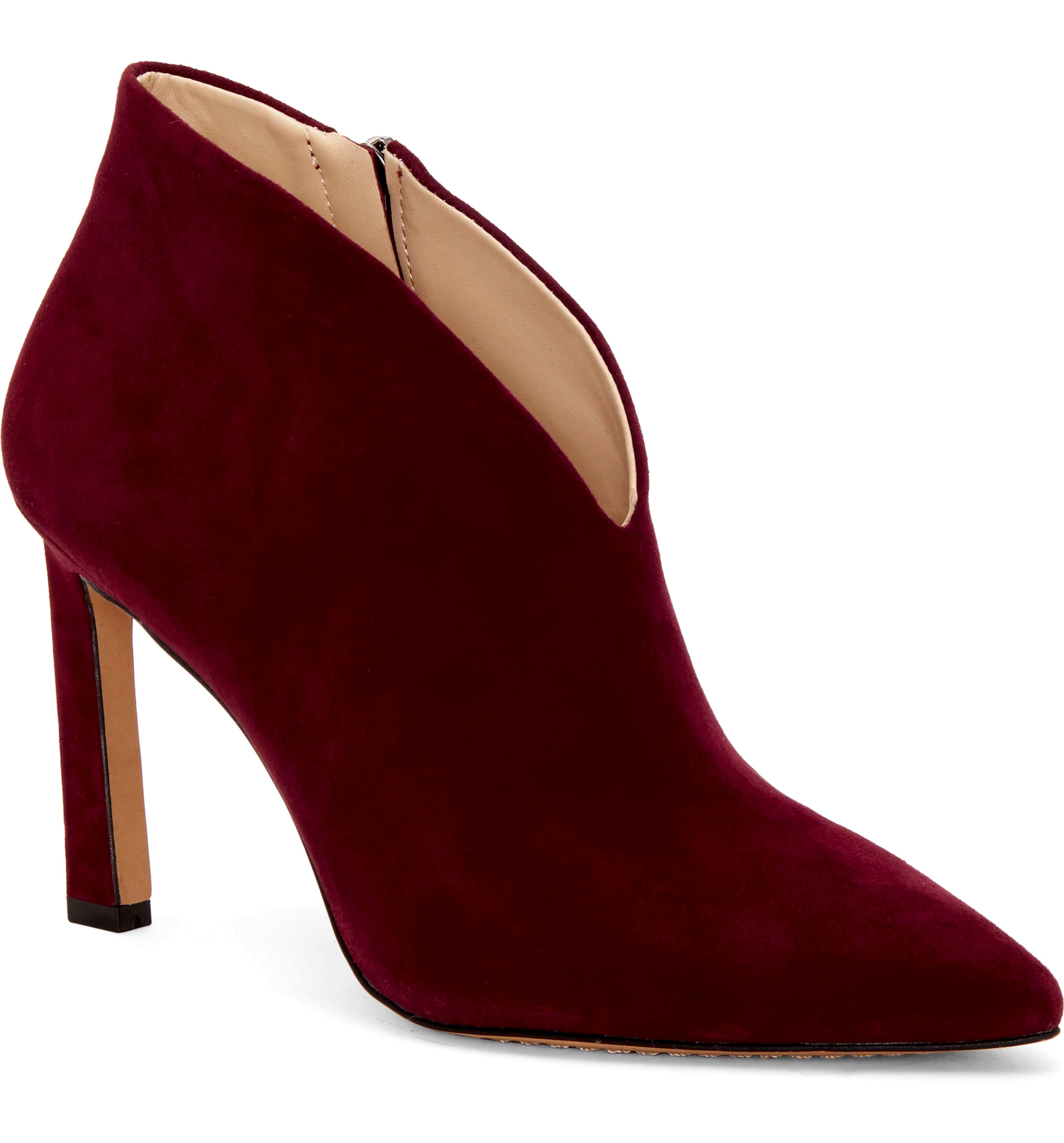 Maroon suede heel boots.