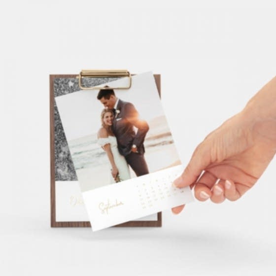 A calendar card of a wedding couple