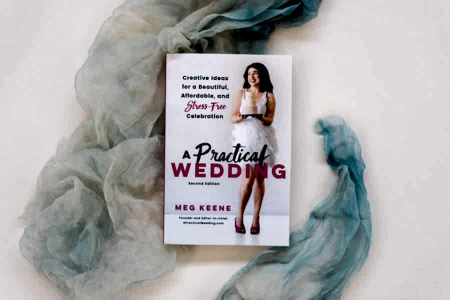 Flat lay image of Meg Keene's new edition of her book A Practical Wedding