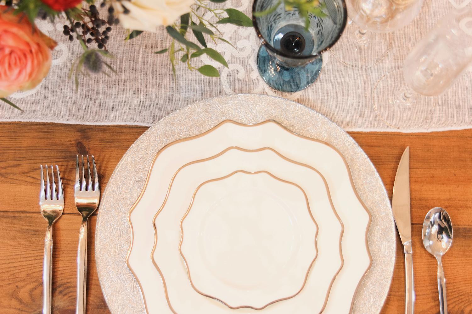 Overhead view of a table place setting for wedding rentals.