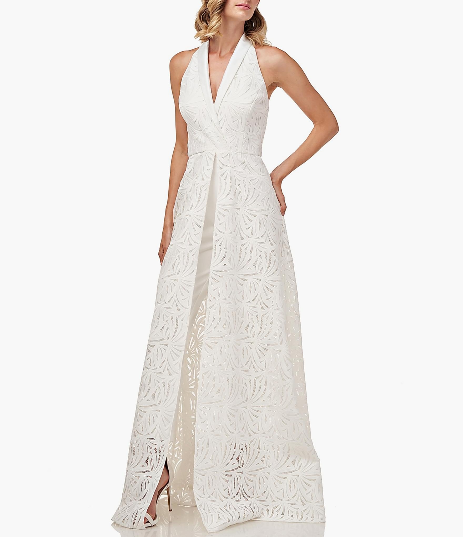 Lace skirt overlay and you know this wedding jumpsuit is the best of all worlds.
